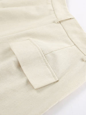 Buttoned vest and shorts set in cream cotton with a flap pocket detail.