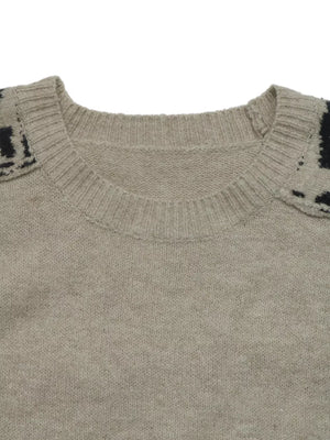 beige pullover sweater with seam detail and long sleeve