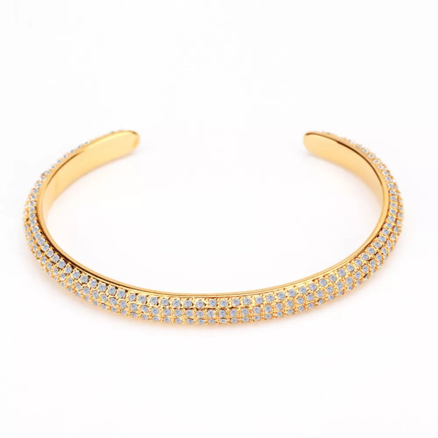 18K Gold-Plated, Copper, Zircon Care instructions: Avoid wearing during exercise bracelet in Gold with open cuff silhouette