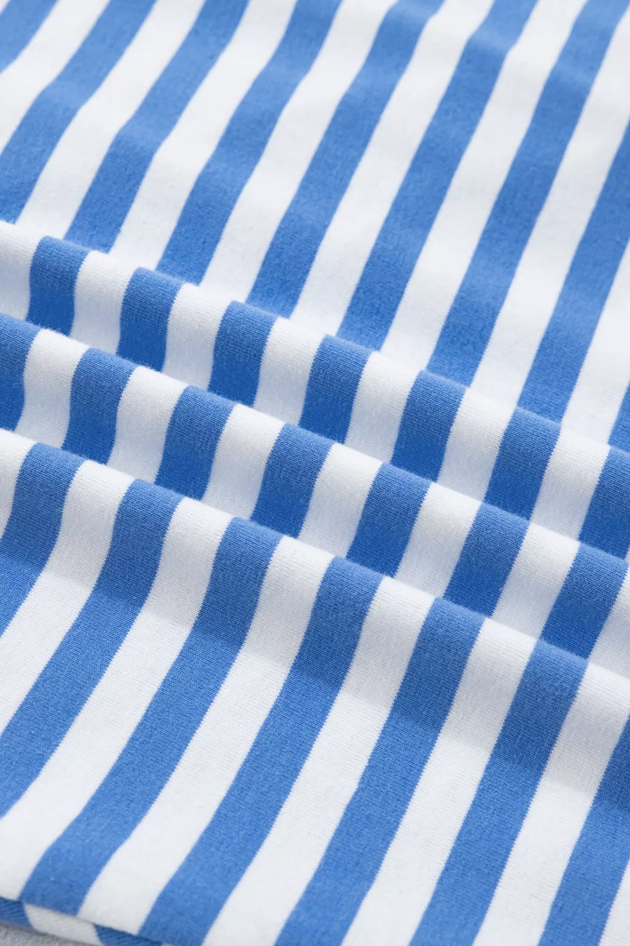 Nautical stripe mini dress in blue and white cotton with tie detail.