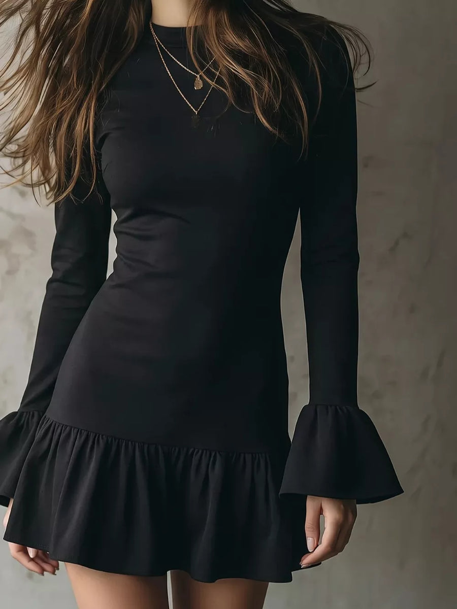 Black fitted mini dress with round neck