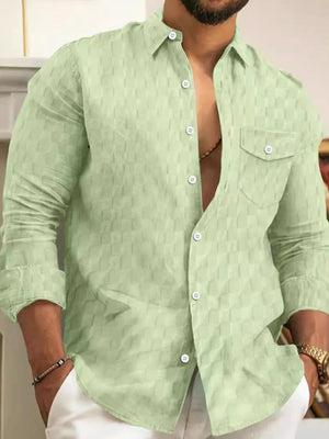 Light green textured cotton button-up shirt with a subtle geometric pattern and chest pocket.