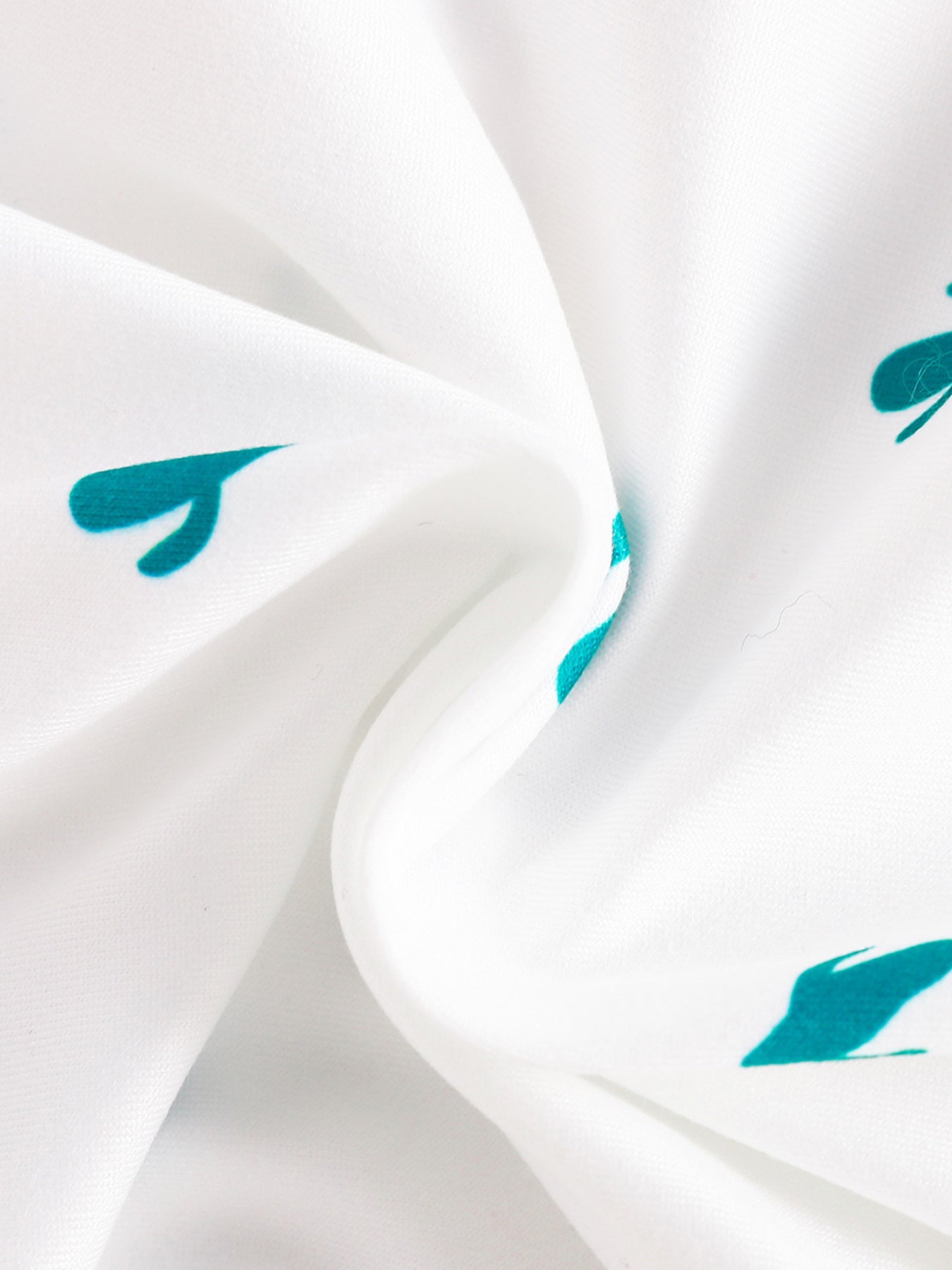 White baby bodysuit with teal cactus print