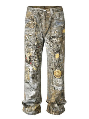 Distressed treasure print wide leg denim jeans in gray with intricate chain and charm patterns.
