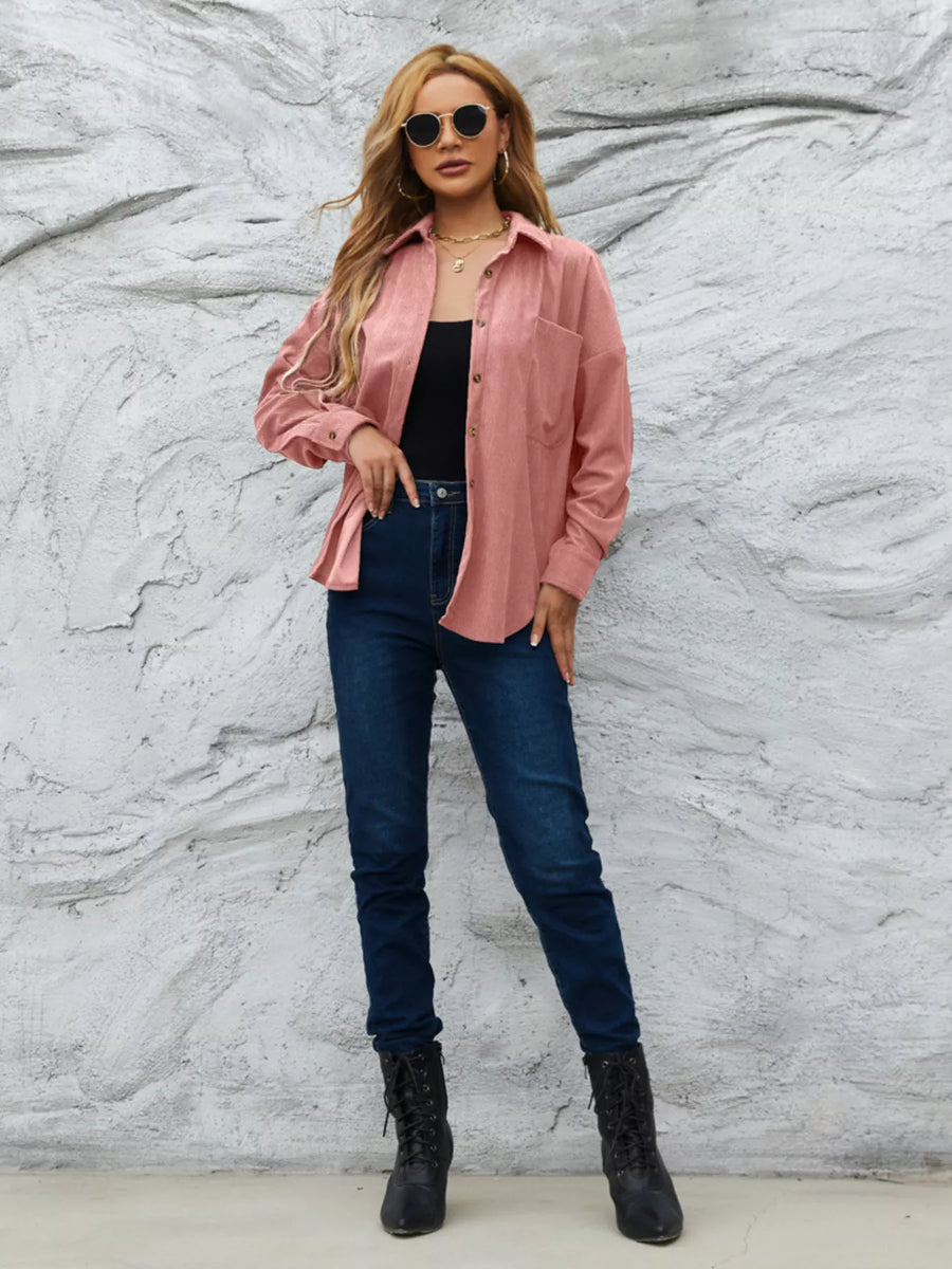 Pinkish corduroy button-up overshirt with a chest pocket and relaxed fit.
