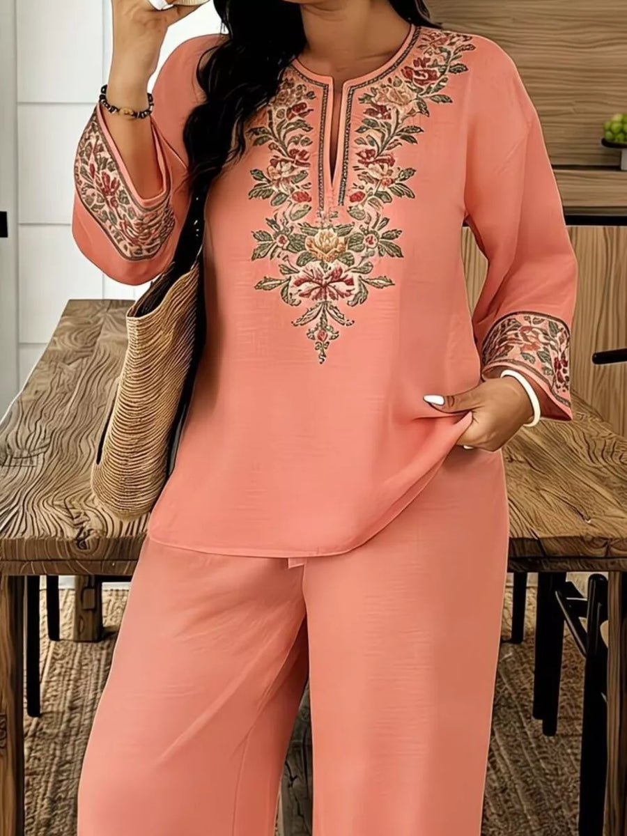 Peach embroidered tunic with wide sleeves and matching wide-leg pants.