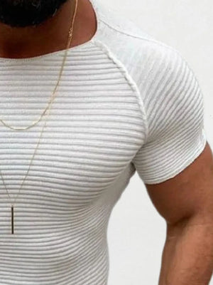 Ivory ribbed raglan tee with a sculptural fit and crew neck.