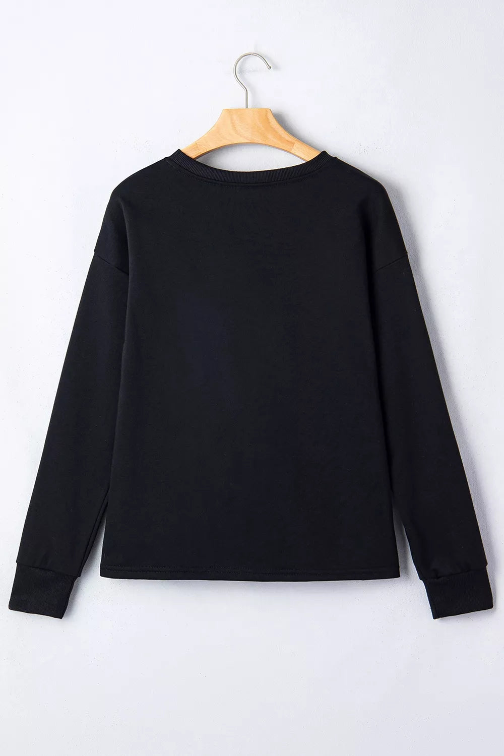 sweatshirt in orange with checkered and rhinestone embellishment