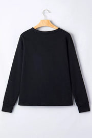 sweatshirt in orange with checkered and rhinestone embellishment