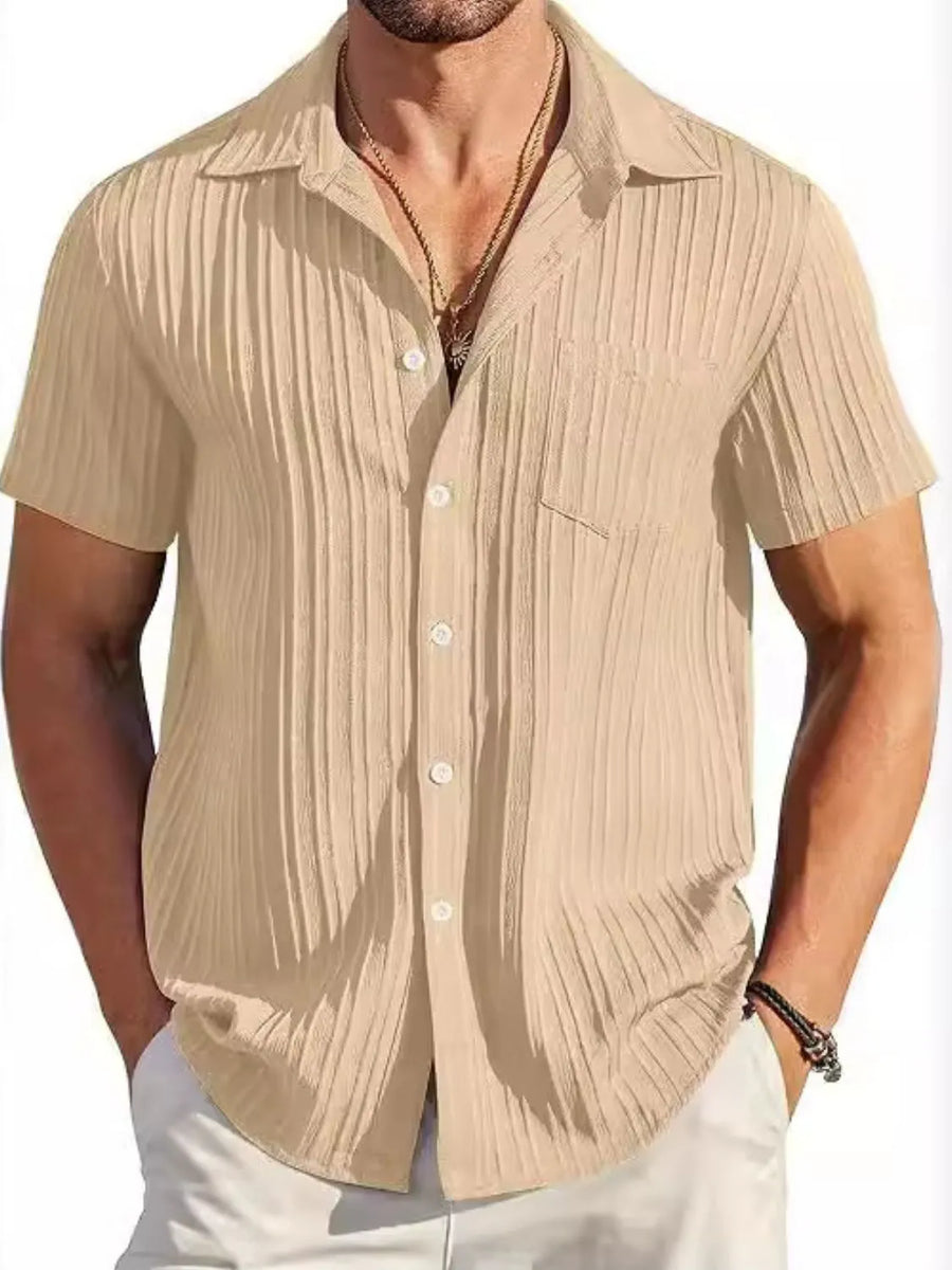 Khaki textured pleated resort shirt with short sleeves and button front.