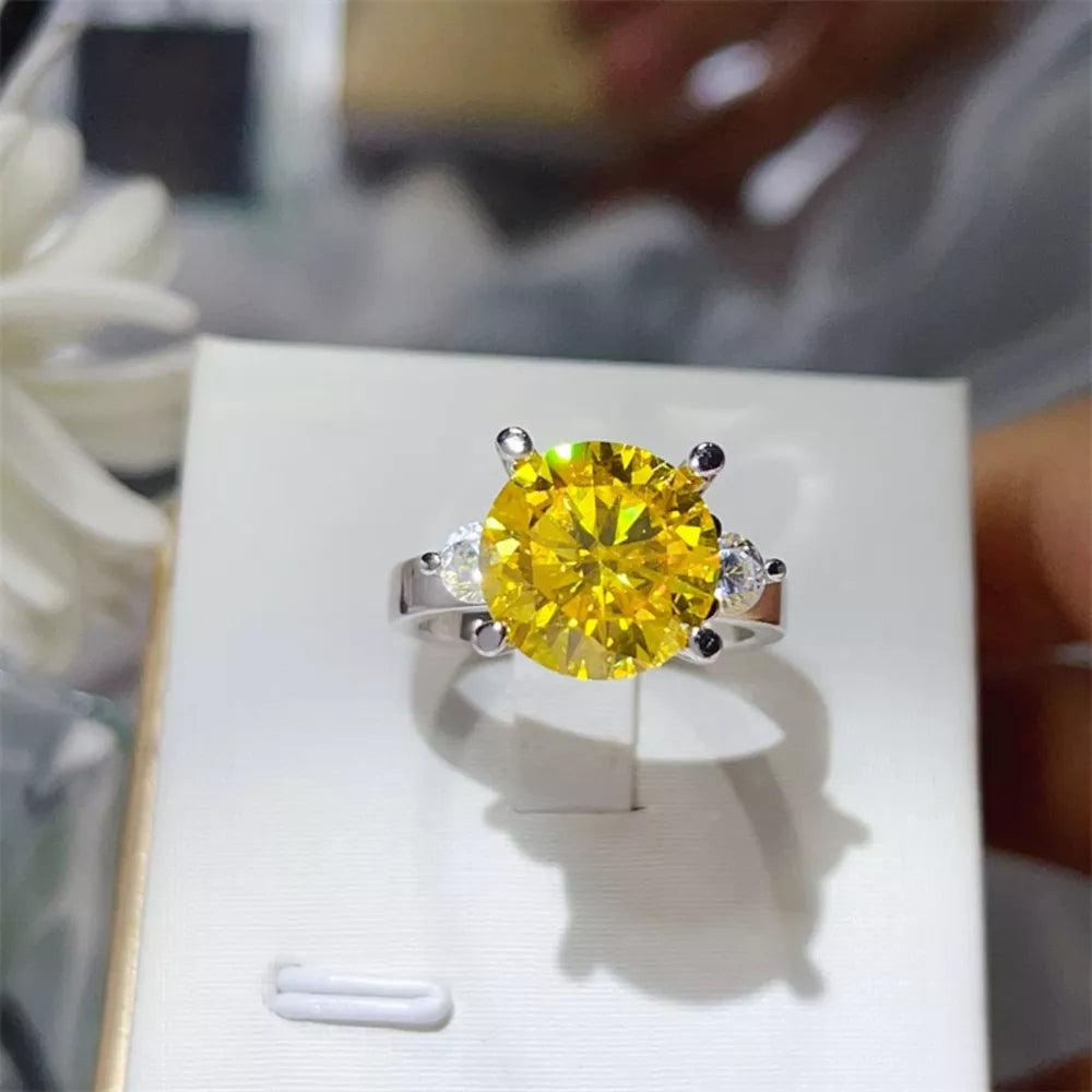 ring in yellow featuring 5 carat moissanite and fitted fit