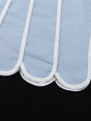 Light blue cotton top with white scalloped trim and piping detail