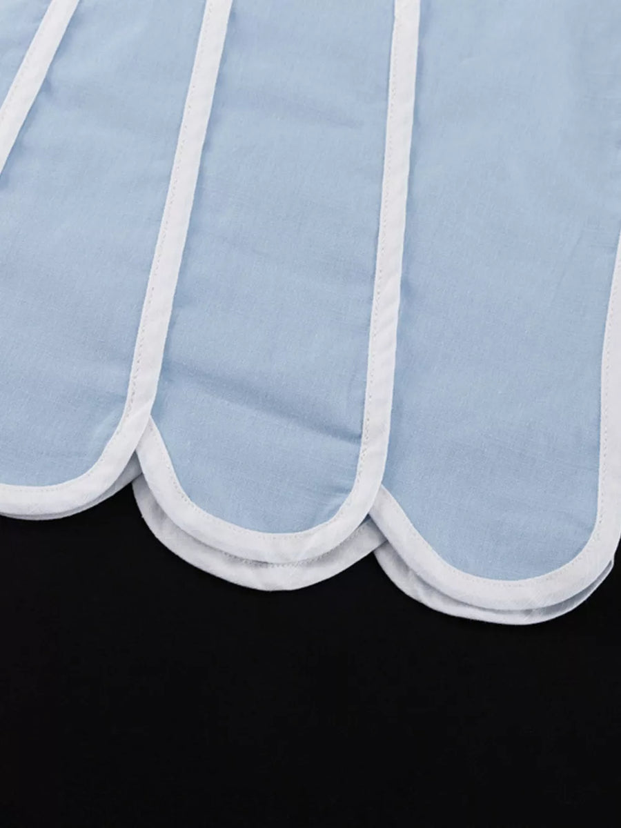 Light blue cotton top with white scalloped trim and piping detail