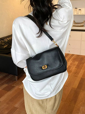 Yellow shoulder bag with small and twist lock