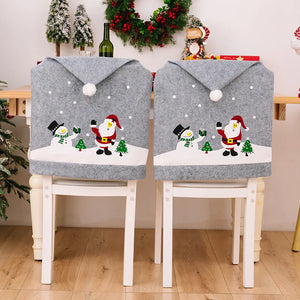 Gray chair covers with Santa and snowman applique, perfect for Christmas decor