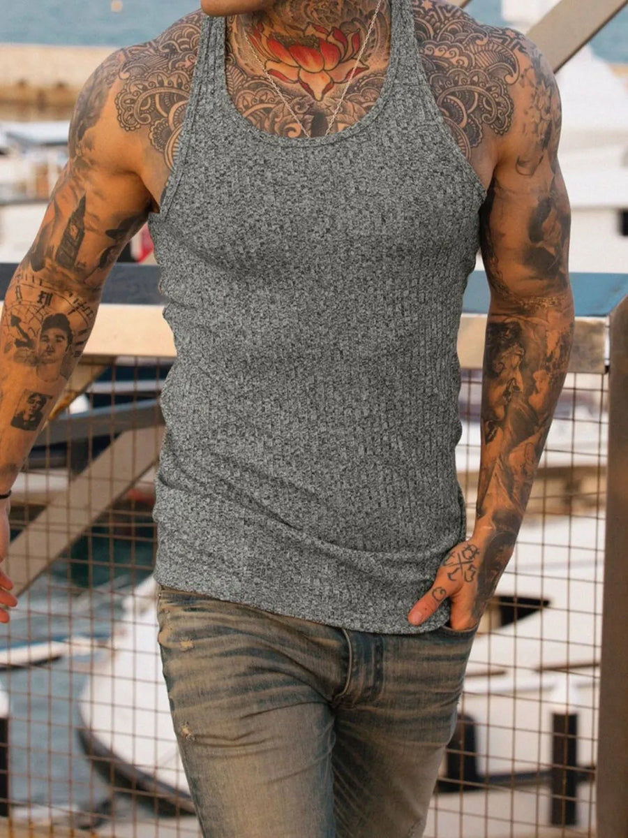 Gray ribbed muscle tank with a scoop neck and sculpted fit.