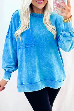 80% cotton, 20% polyester Care instructions: Machine wash cold sweatshirt in aqua blue with oversized silhouette