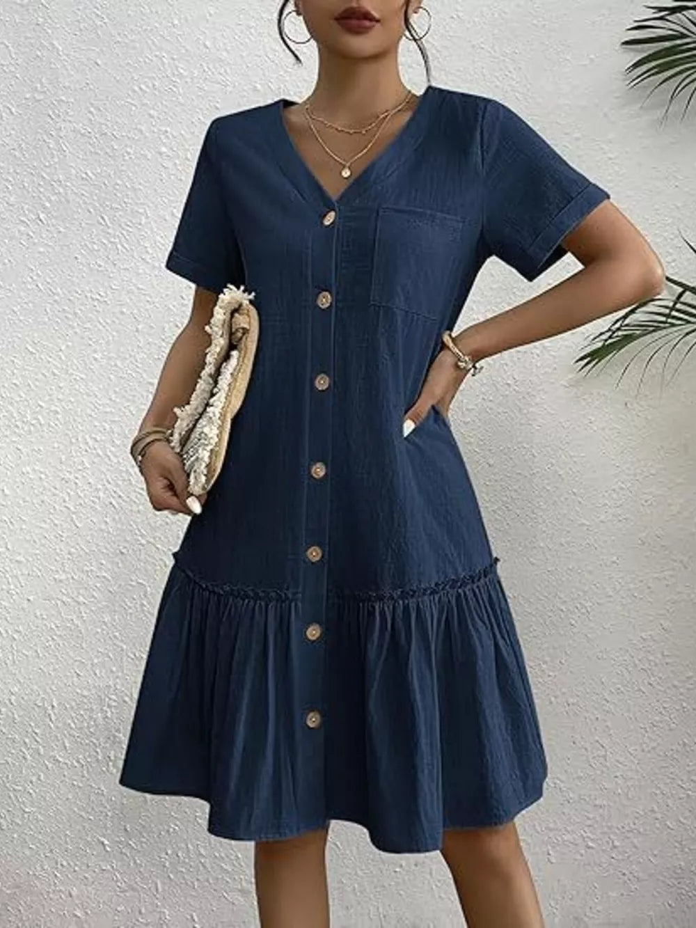 coastal mini dress in Black with v-neck