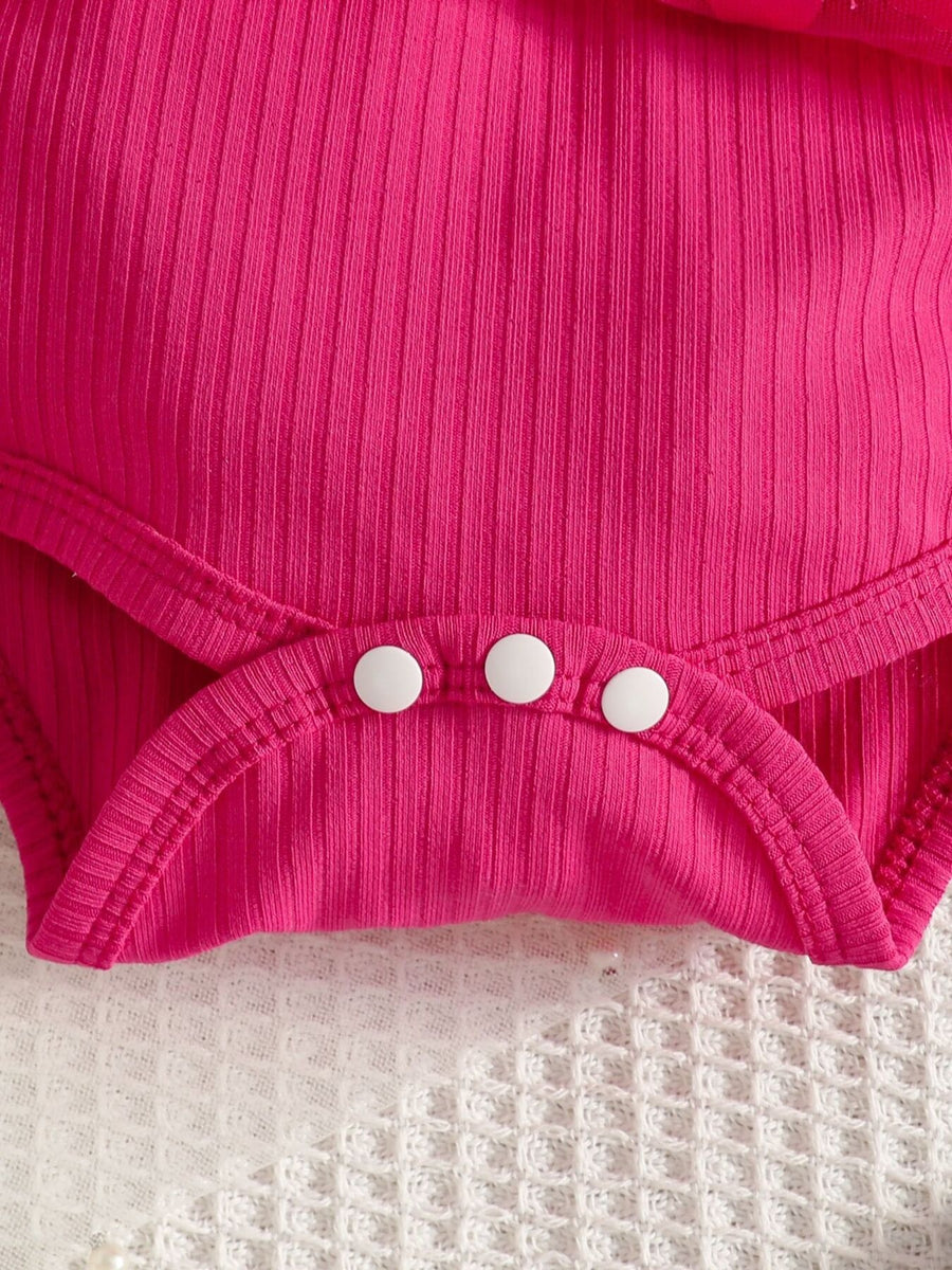95% polyester, 5% spandex Care instructions: Machine wash cold bodysuit in fuchsia with fitted silhouette