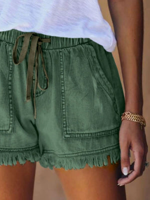 denim shorts in Pink with raw hem and mini