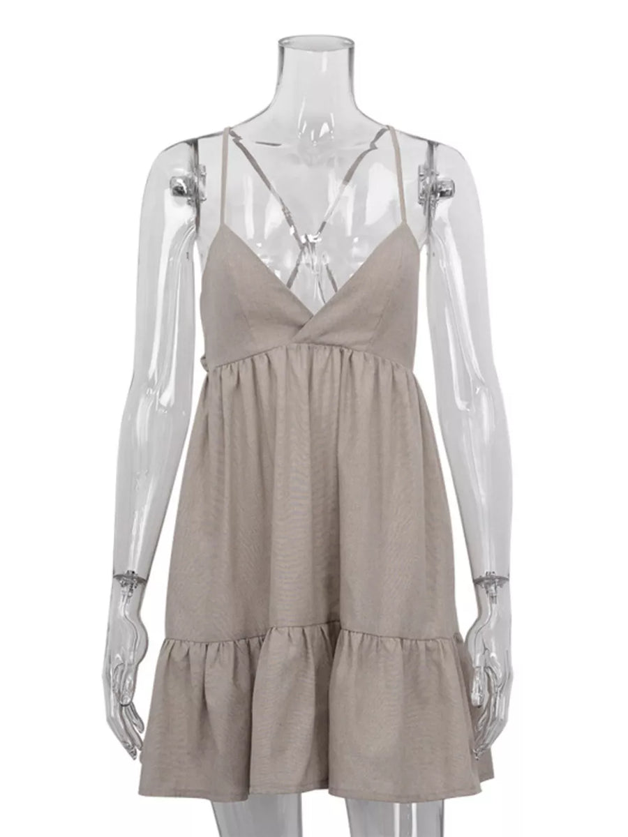 Beige linen blend mini dress with spaghetti straps, V-neck, and tiered ruffle hem