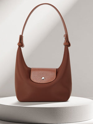 shoulder bag in brown with leather trim and small