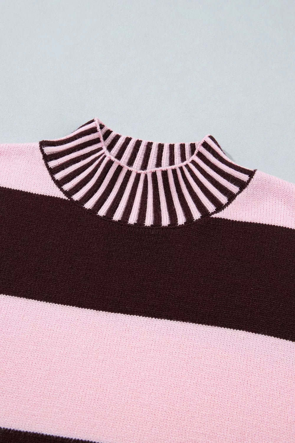 baby pink pullover sweater with ribbed cuffs and long sleeve