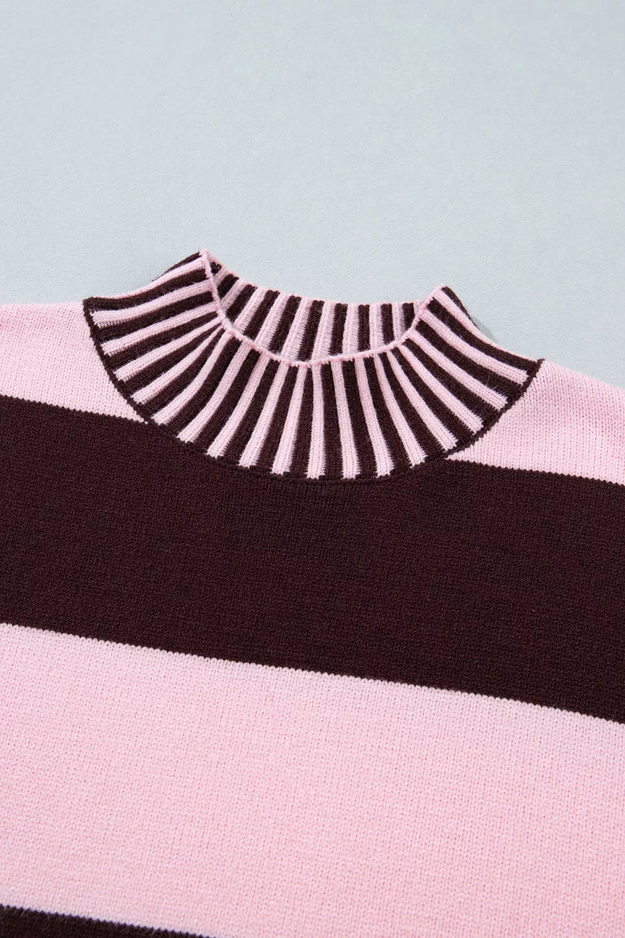 baby pink pullover sweater with ribbed cuffs and long sleeve
