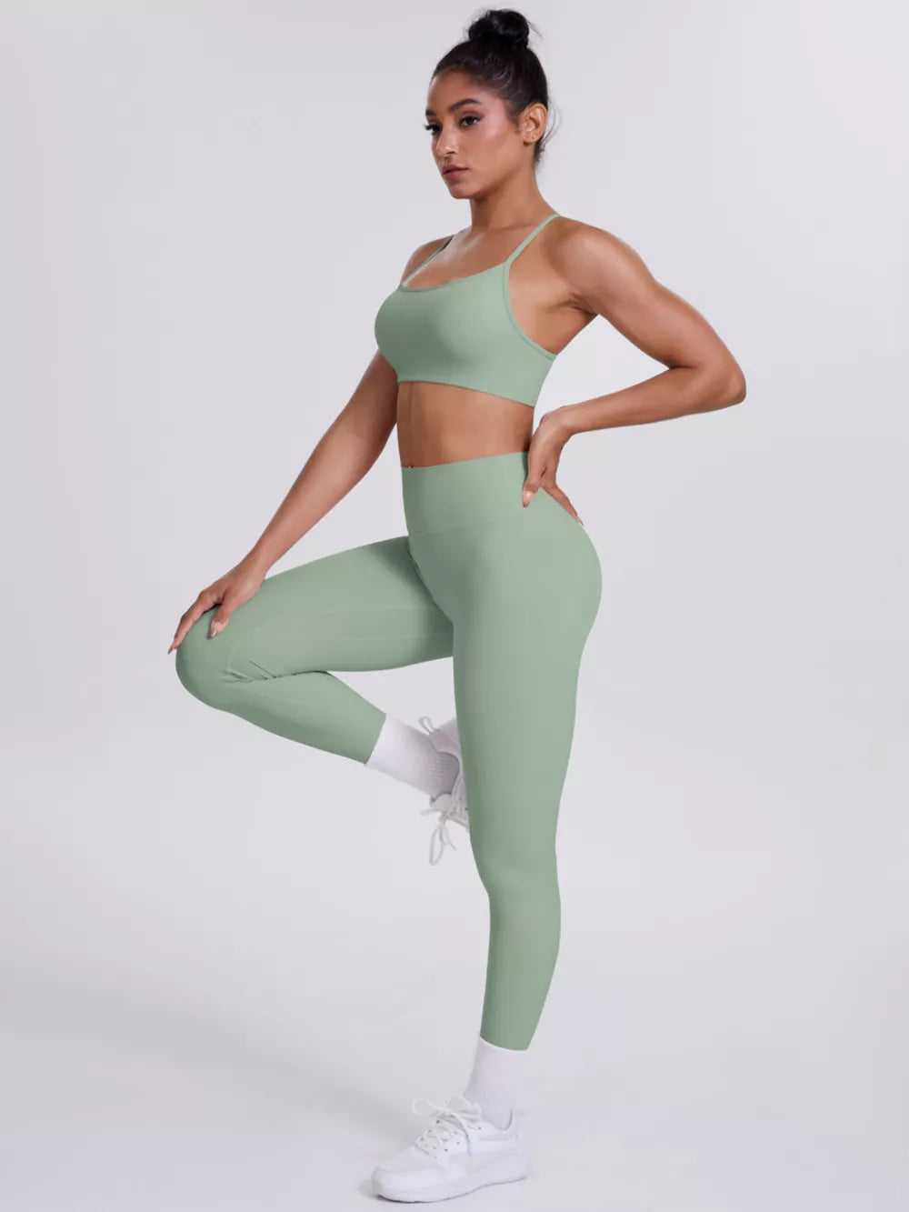 80% nylon, 20% spandex Care instructions: Machine wash cold sports bra in Dark Gray with fitted silhouette