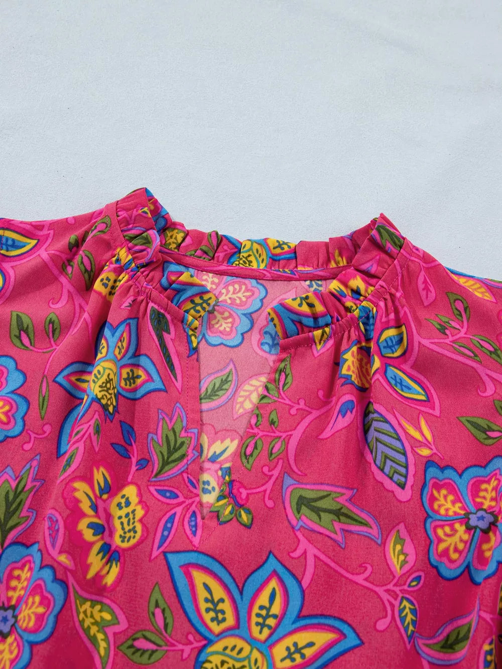 Floral midi dress with ruffled neckline and V-split, cotton blend, cerise with blue and yellow floral print.