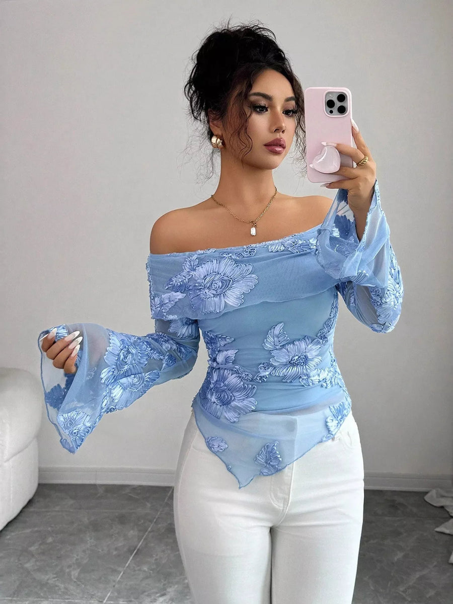 Floral ruffled off-shoulder blouse in sky blue with bell sleeves and sheer fabric.