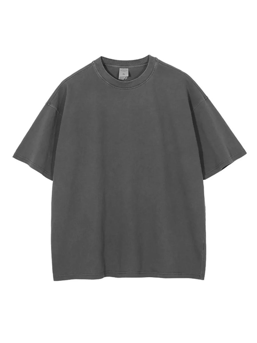 Oversized dark gray washed cotton tee with relaxed fit and crew neck.