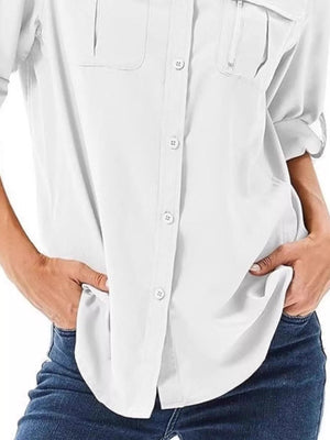 White button-up shirt with roll-up sleeves and chest pockets.