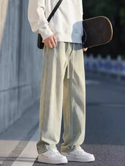Oversized drawstring jeans in light tan with a loose fit and casual styling.
