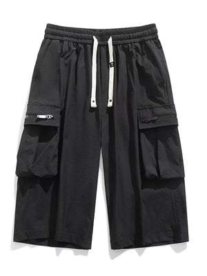 Black cargo shorts with zippered pockets and drawstring waist
