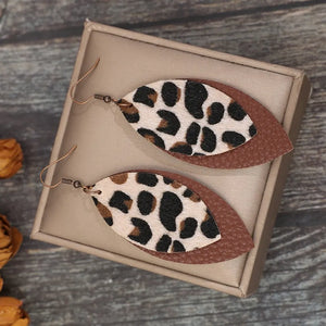 Leopard print layered leather dangle earrings in brown with boho style.