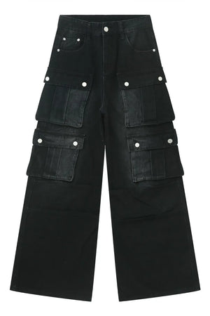 Oversized dark denim cargo pants with multiple flap pockets and button closures.