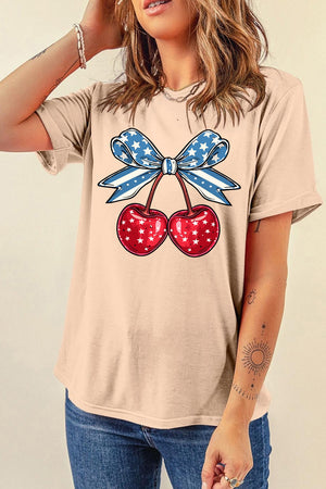 Tan graphic t-shirt with patriotic cherry and star bow design.