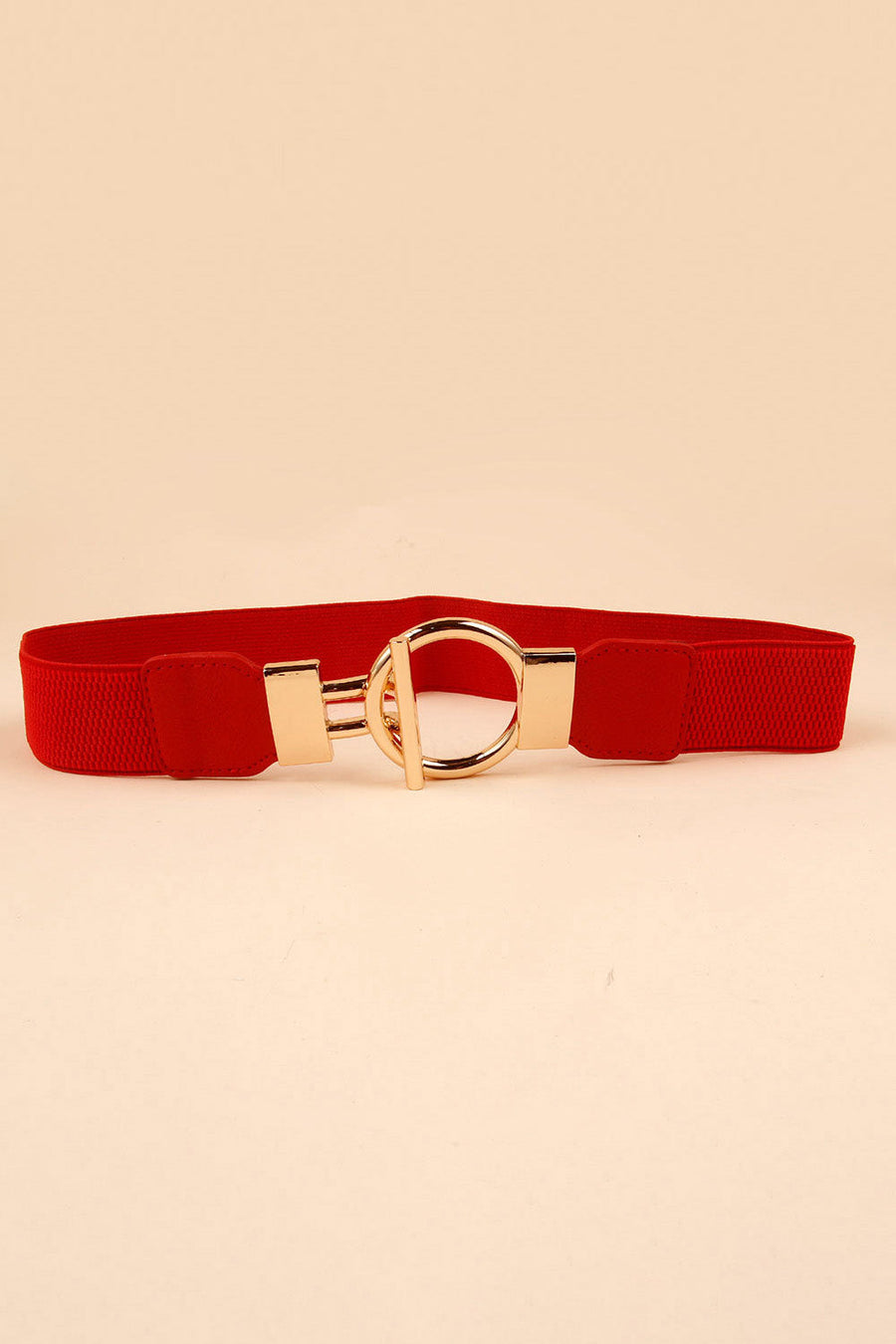 Red elasticated belt with gold ring buckle and T-bar closure