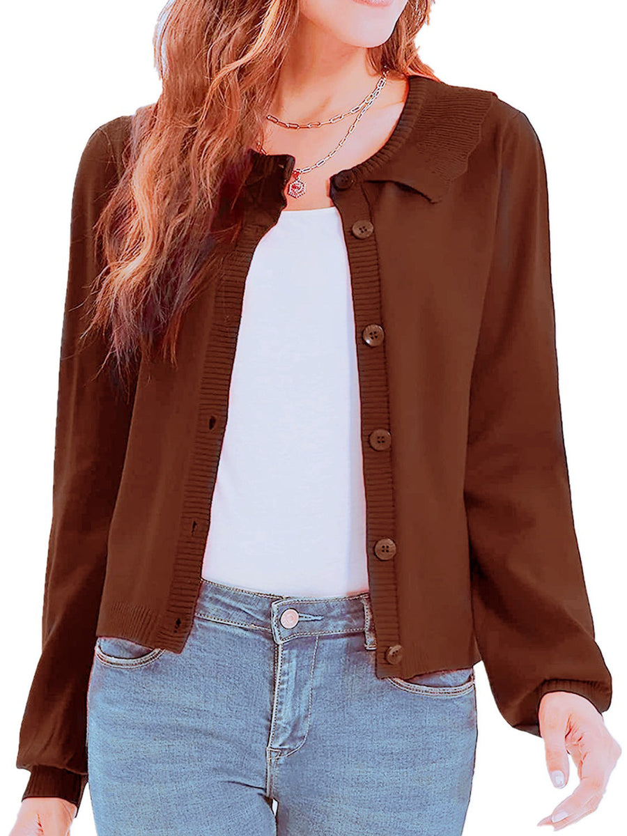 Chocolate knit cardigan with scalloped collar and button front, styled with jeans.