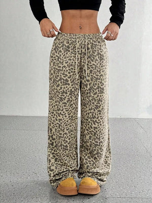 wide-leg pants featuring leopard-print in black with 95% polyester, 5% elastane Care instructions: Machine wash cold texture