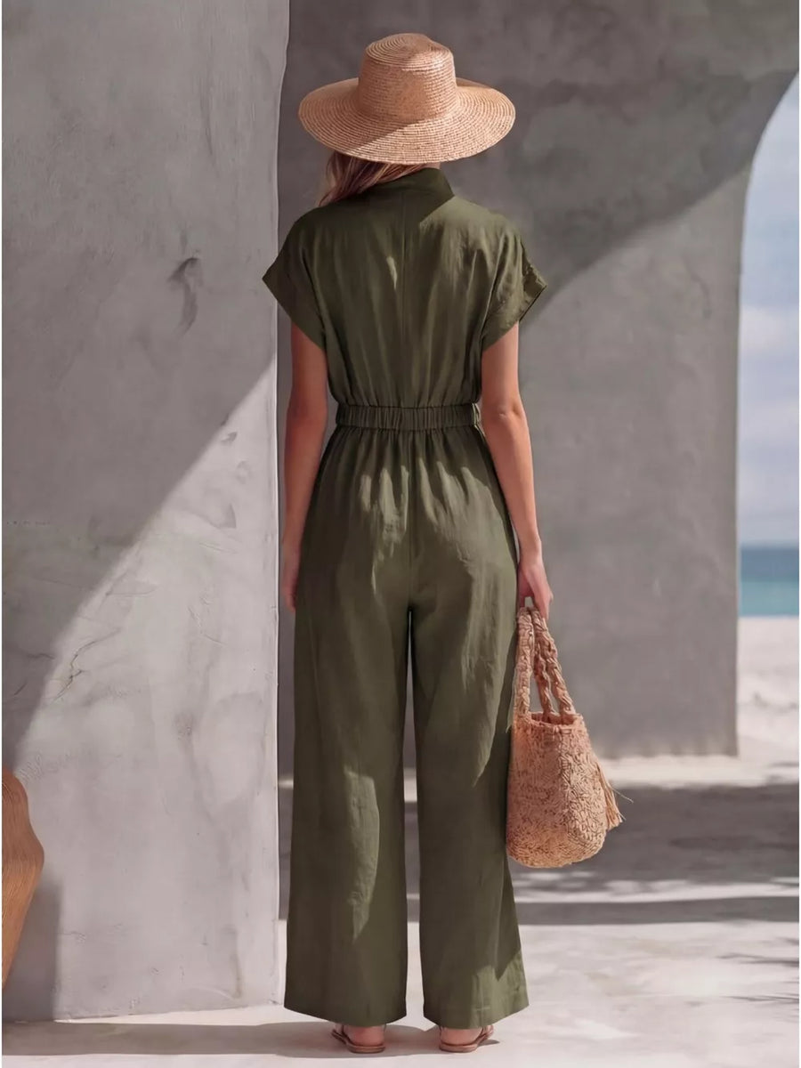 Army green wide-leg jumpsuit with elastic waist and short sleeves, shown from the back.