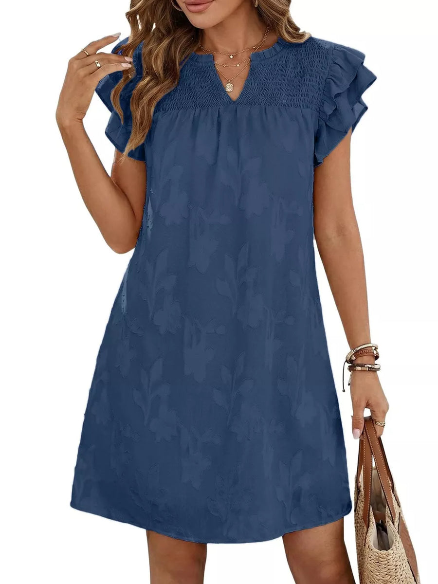 Blue floral embossed mini dress with smocked bodice and ruffle sleeves.