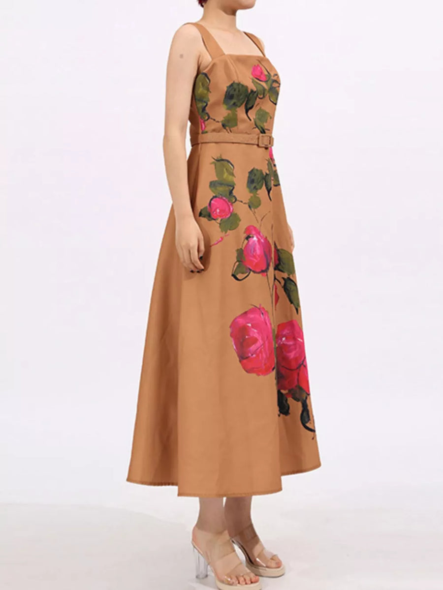 Brown midi dress with rose print, square neck, sleeveless, and belted waist