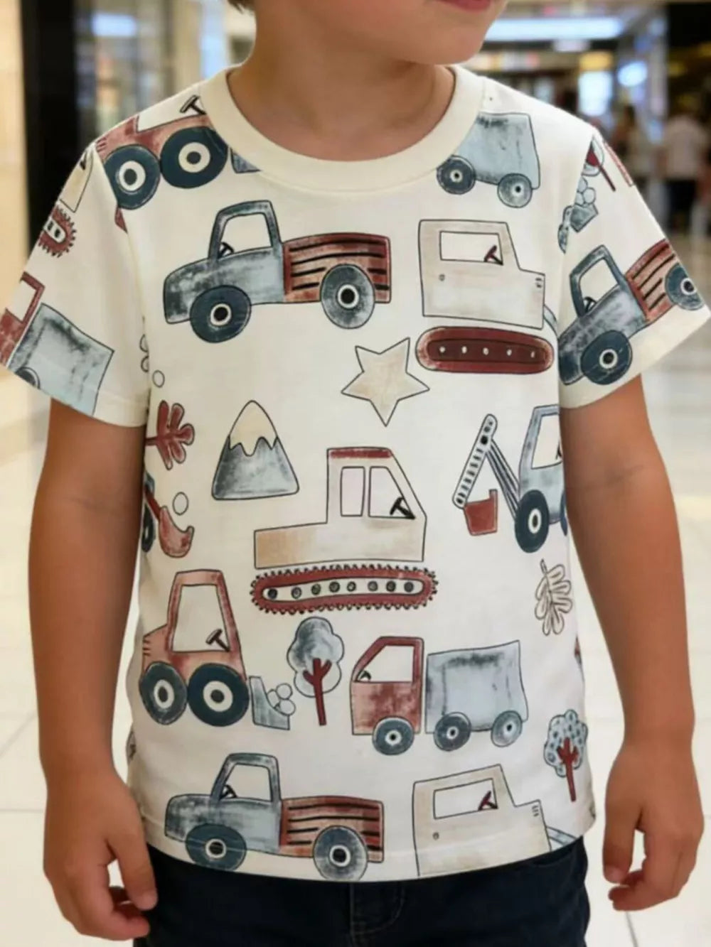 Baby & children's cotton t-shirt with playful construction truck graphic print.
