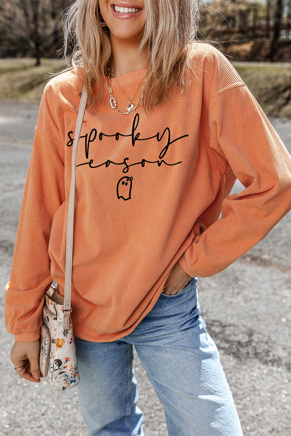 tangerine sweatshirt with graphic print and crew neck