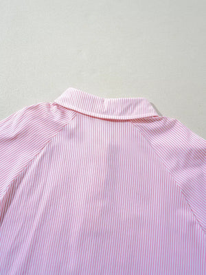 Pink and white striped collared shirt with a classic collar.