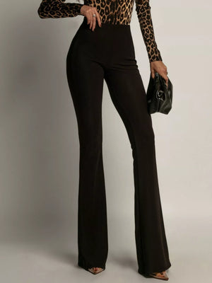 Black high-waisted flared trousers with an elegant silhouette.