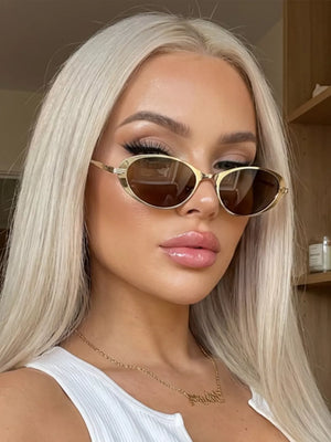 AC Frame material: Metal Lens material: Polycarbonate Temple material: Metal Imp sunglasses in black with oval silhouette