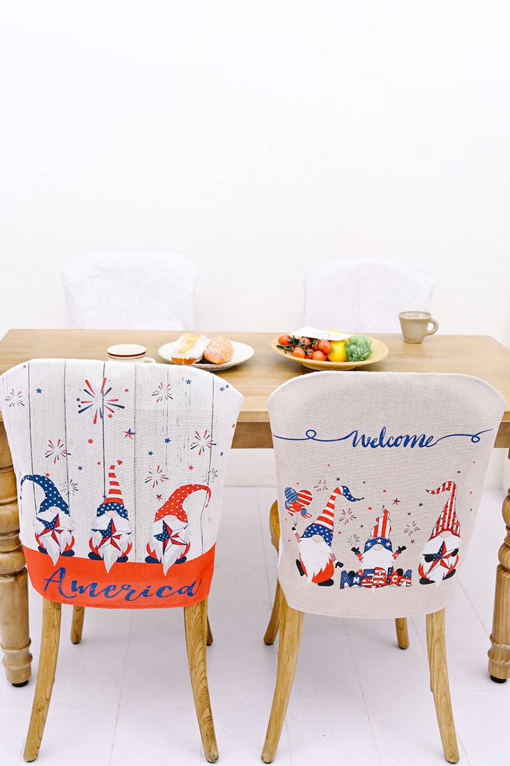 Patriotic gnome chair back covers in multicolor with fireworks and "America" or "Welcome" text.